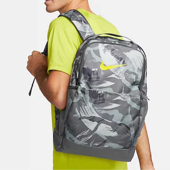 grey and yellow nike backpack